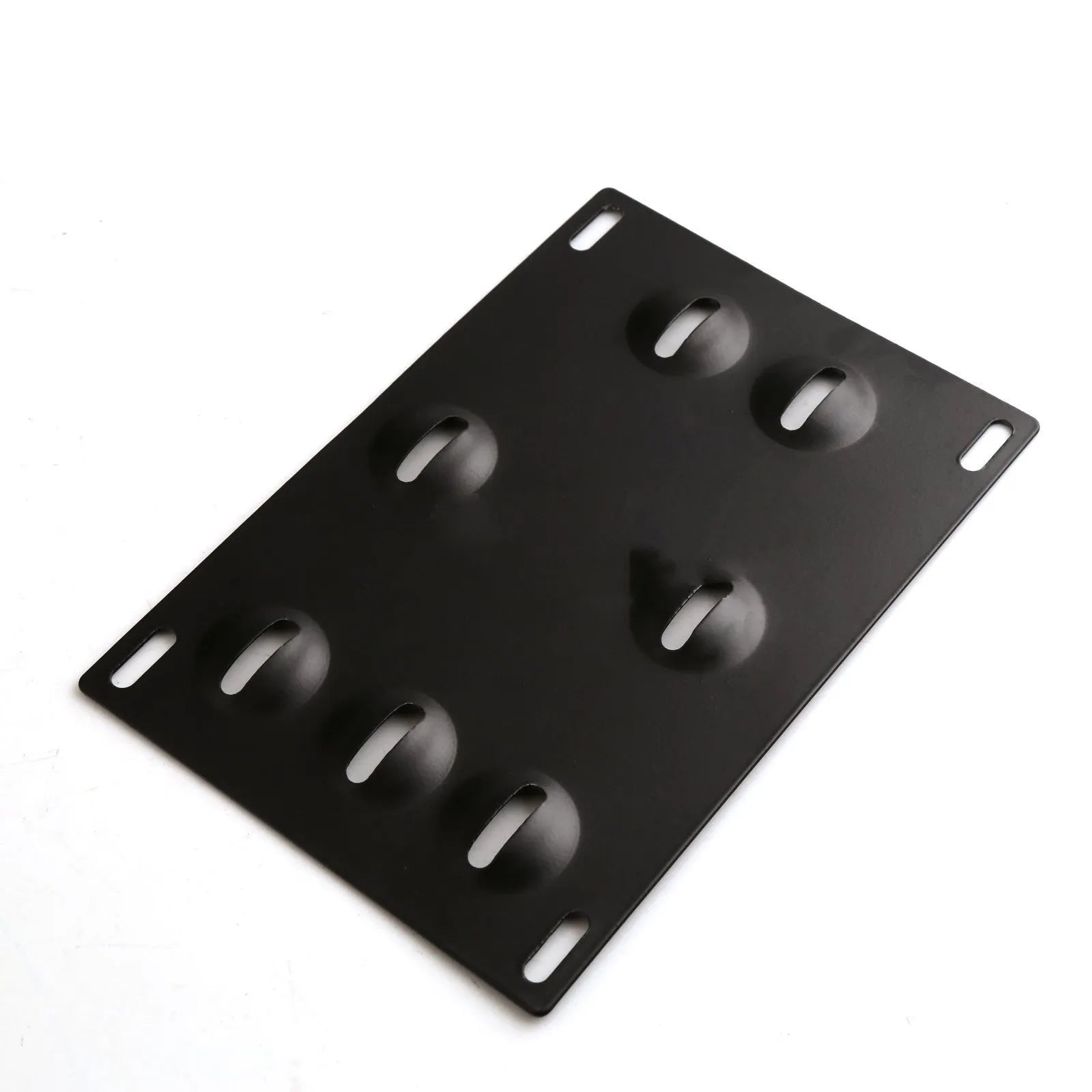 Silver metal car licence plate frame with a central towing hook, next to screws and a nut.