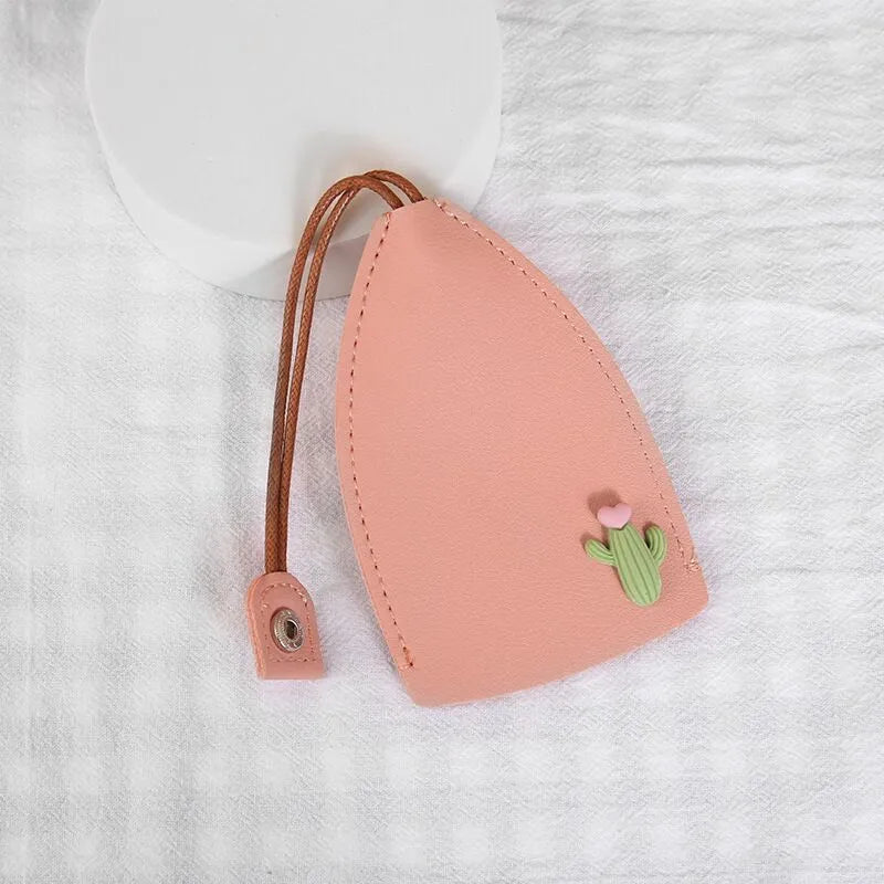Cartoon style pull-out car key case made from PU leather in assorted designs