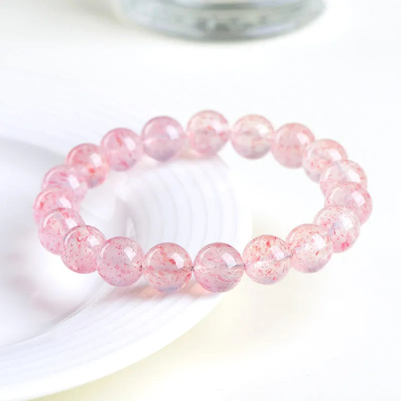Strawberry quartz crystal bracelet with geometric 10-10.8mm beads