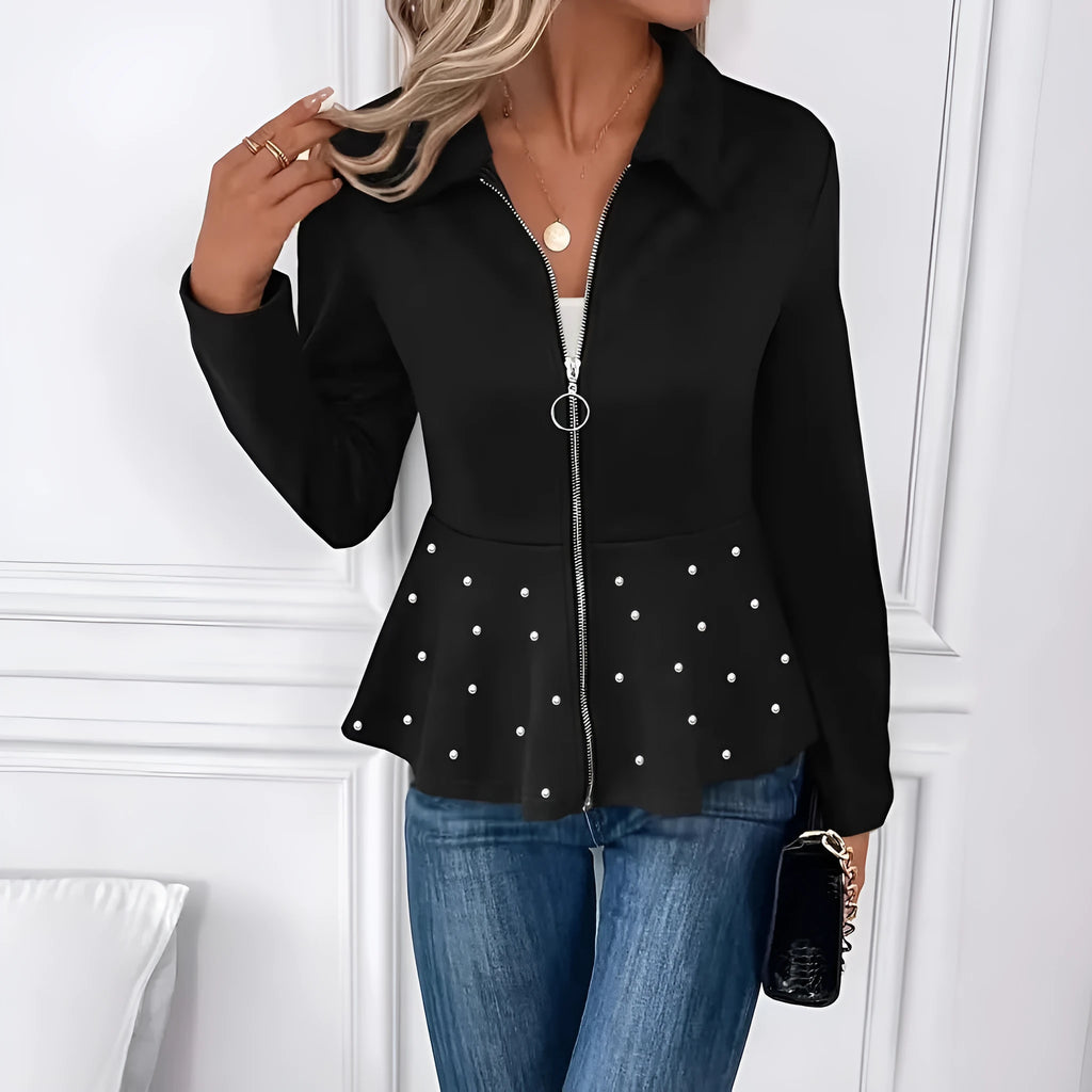 Women's black loose fit coat with heavy-duty zipper and beaded ruffled hem detail