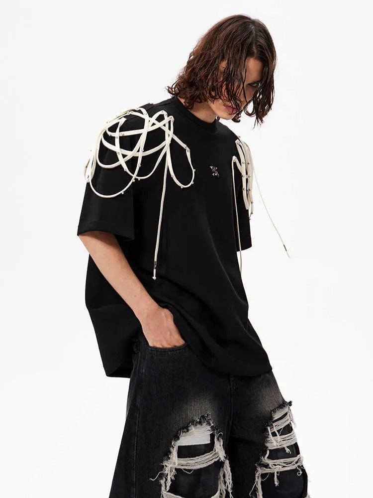 Black loose fit T-shirt with rivet ribbon padded shoulder details and short sleeves