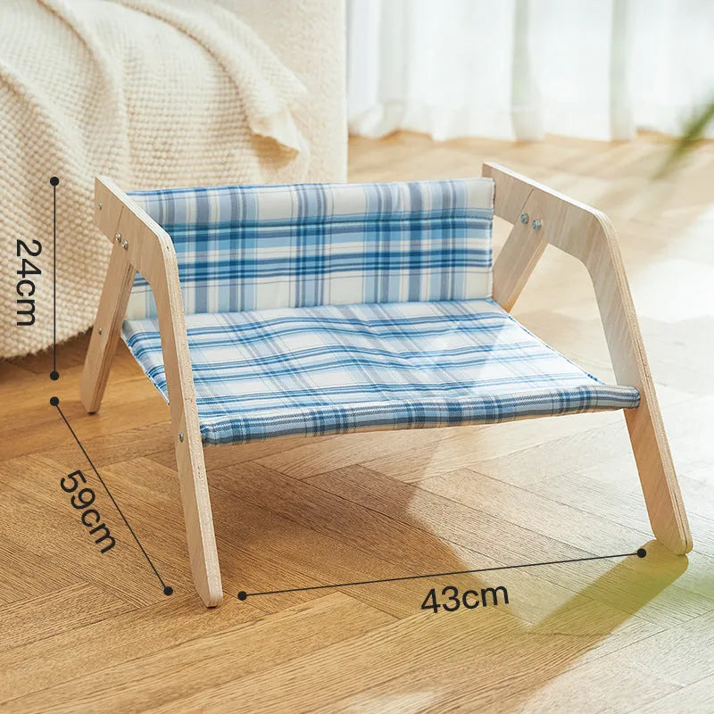 Wooden frame elevated cat bed with cloth hammock in beach chair design for indoor cats