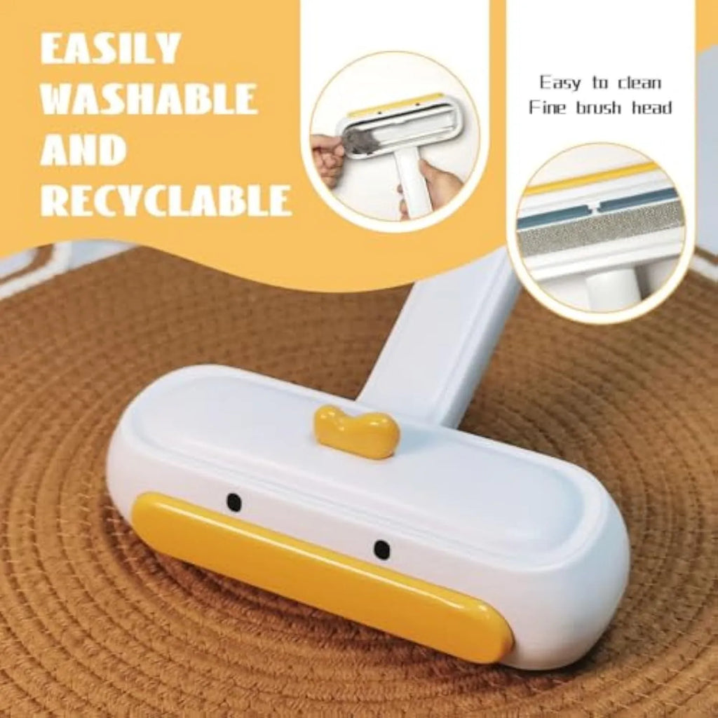 White duck-shaped pet hair remover tool with handle and bristles for removing pet fur