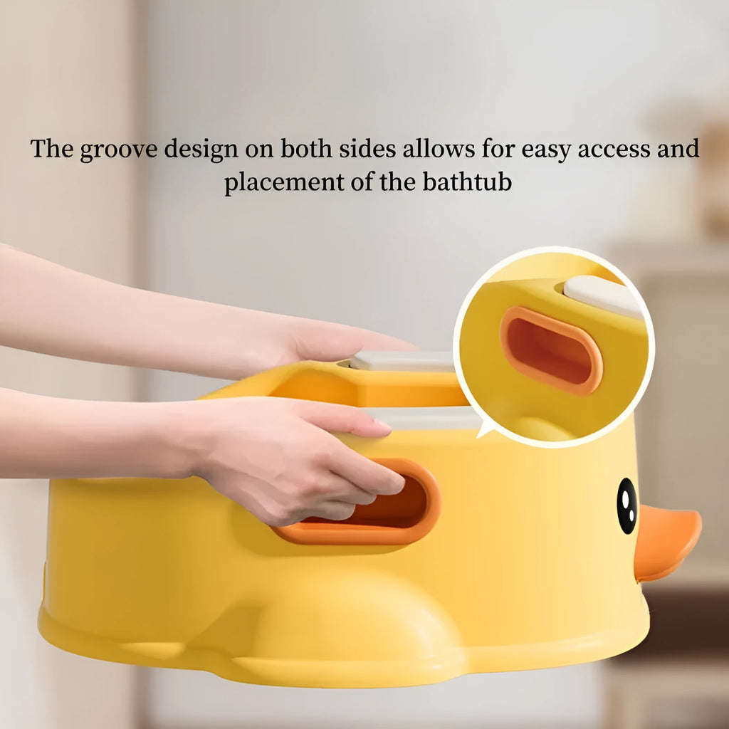 Blue PVC duck-shaped bathtub for washing a dog or cat at home.