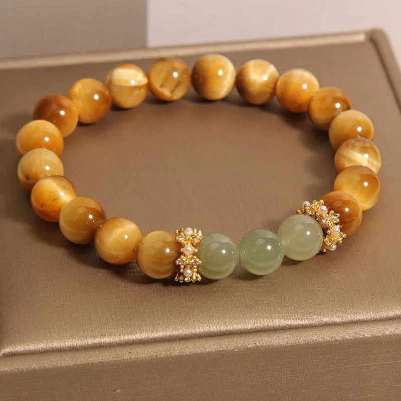 Natural yellow Tiger's Eye stone bracelet in U-shape with auspicious patterns, shown in golden gourd, bamboo joint, and lace styles.