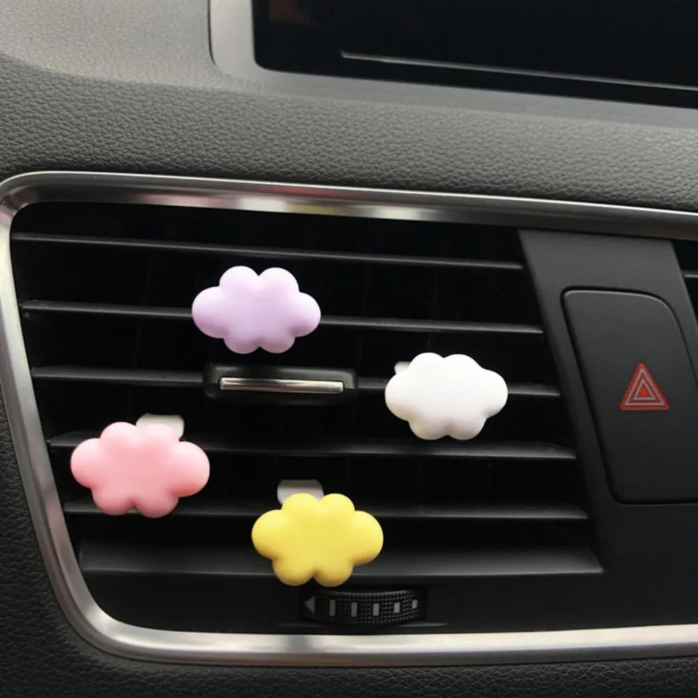 Resin Baiyun cloud cartoon car air freshener clip in pastel colours for vehicle vents.