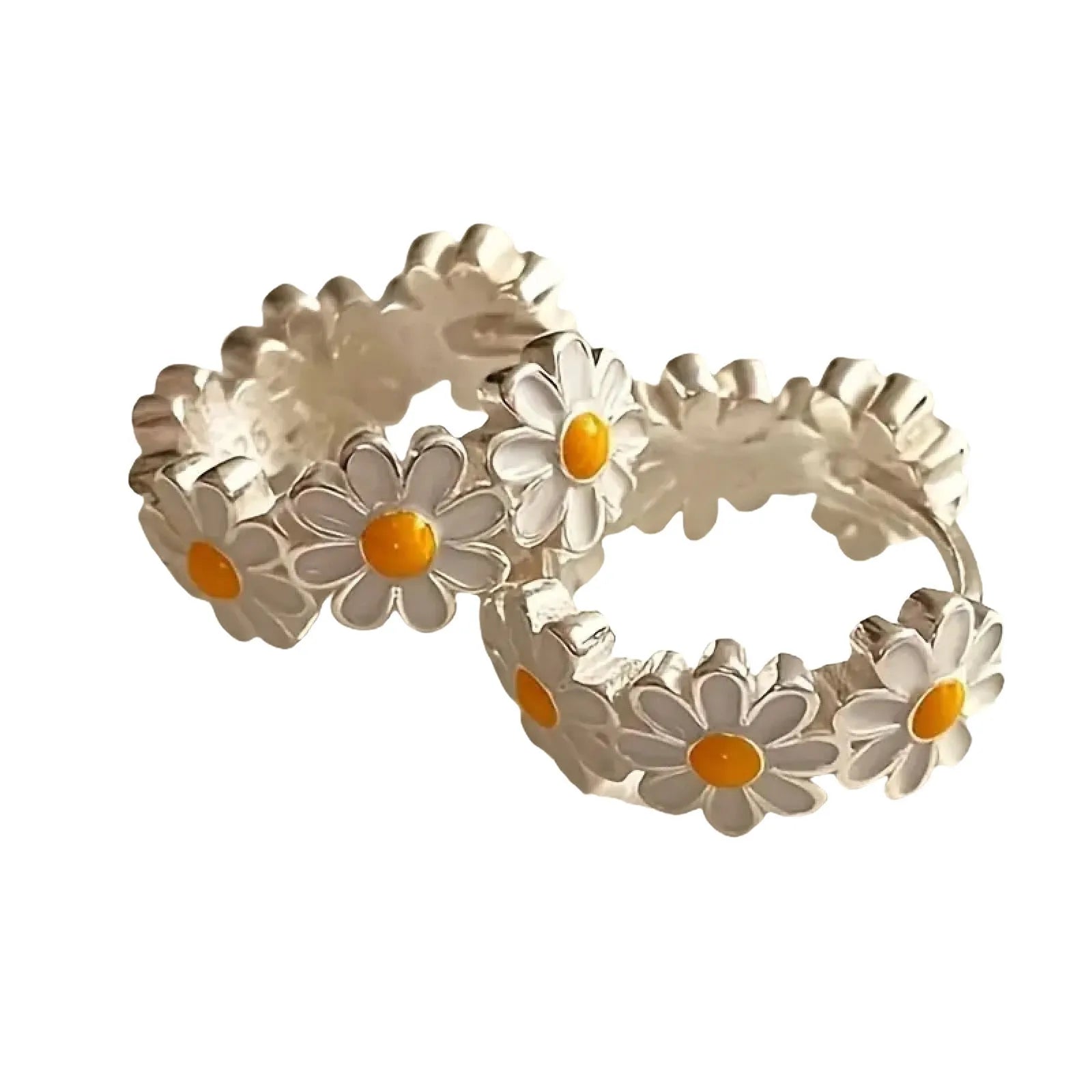 A pair of white daisy flower ring earrings with a gemstone inlay, shown on a model or display.