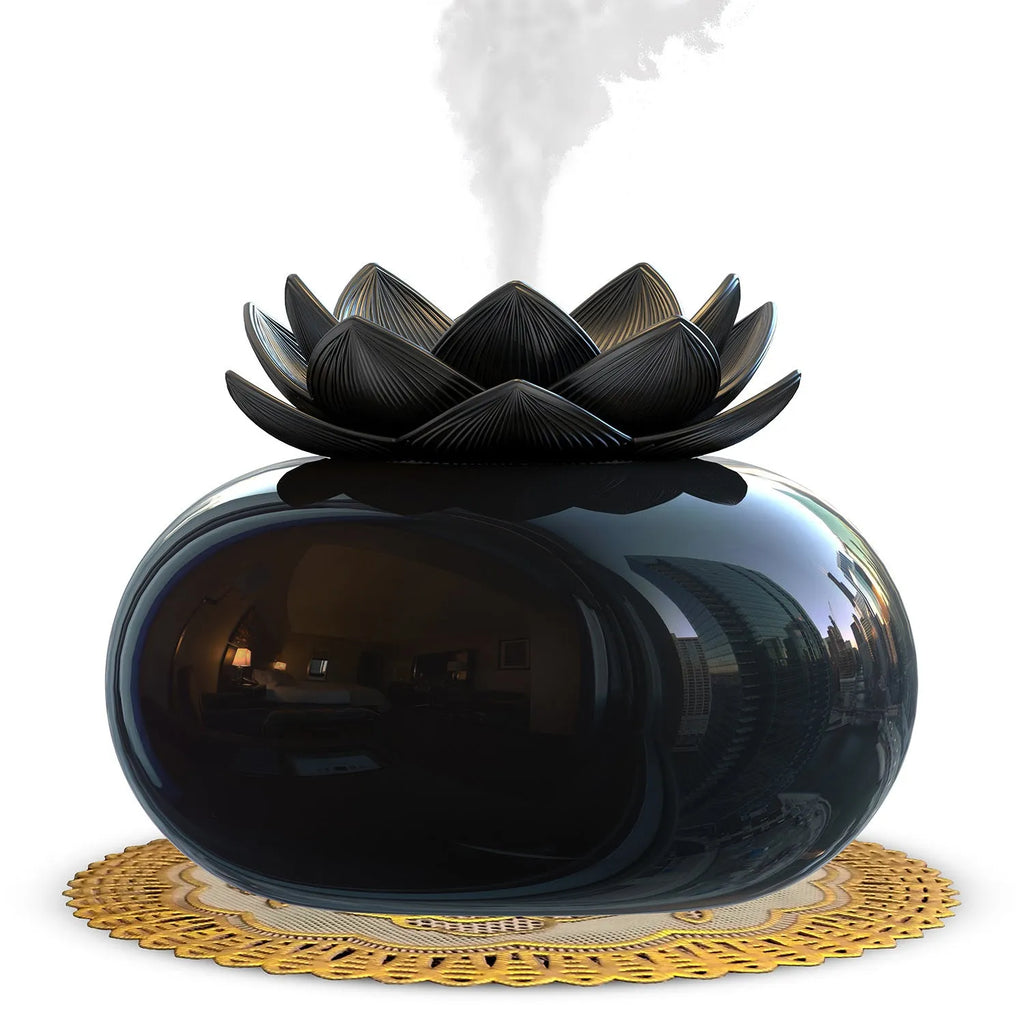 Pure black lotus aromatherapy humidifier with USB cable on desk surface