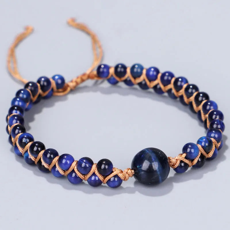 Handmade woven geometric pull bracelet in blue tigereye stone with adjustable cord