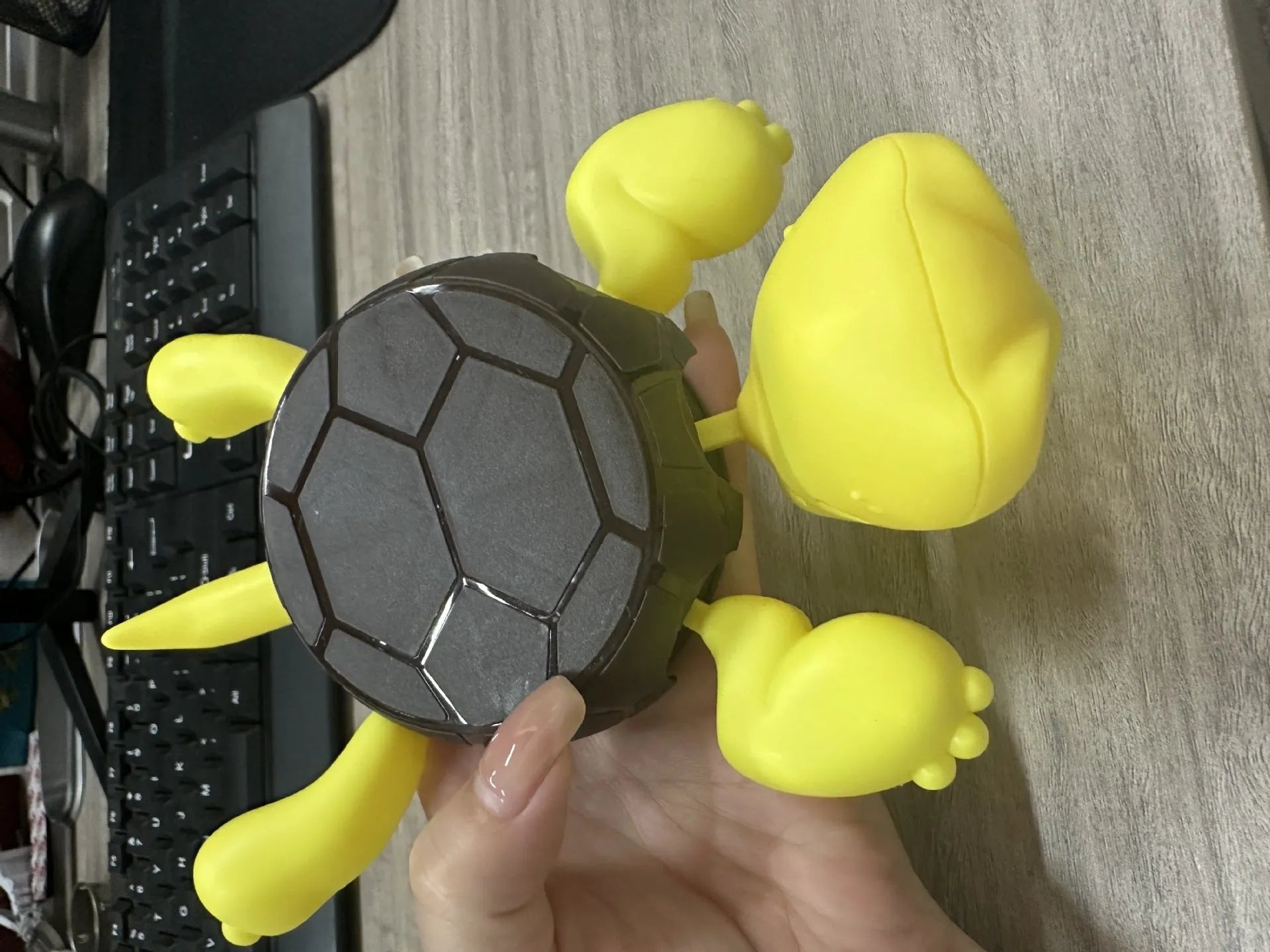 Turtle-shaped ABS plastic coaster in one of four colour options: dark green, light green, wheat starch, or yellow