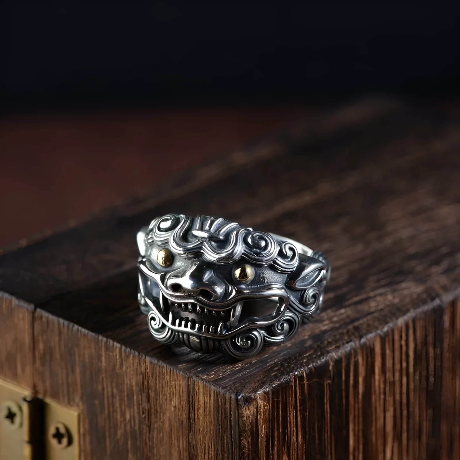 Silver open ring with a personalised diamond jibeast animal zodiac pattern on a hand.