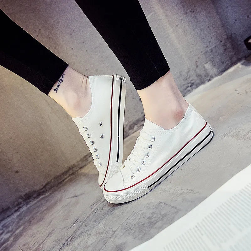 Women's solid colour canvas summer shoes available in black, white black, white red, and all black colour options.