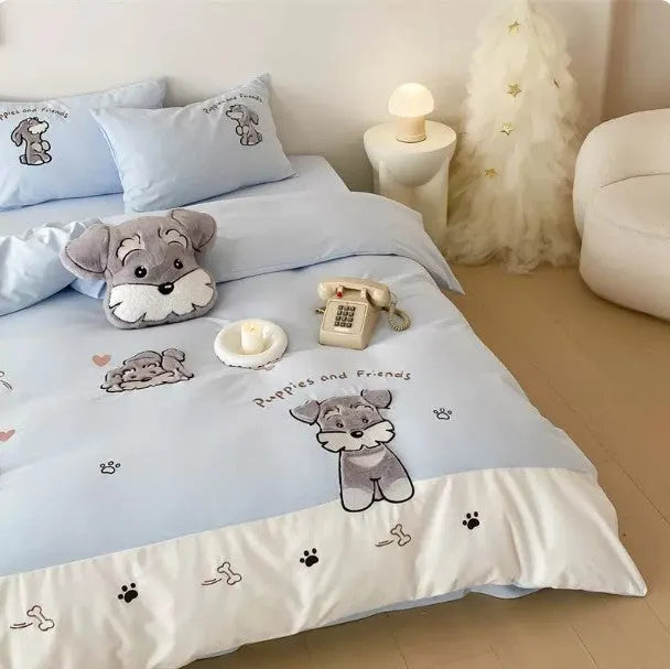 Cartoon Schnauzer embroidered bedding set with flat sheet and matching pillow on bed
