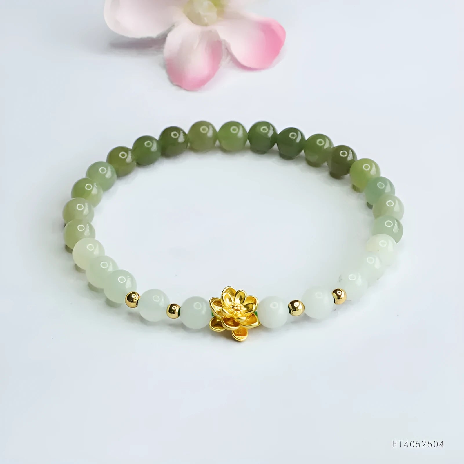 Hand-woven ancient style bracelet with Hetian jade water gradient colour and flower shape.