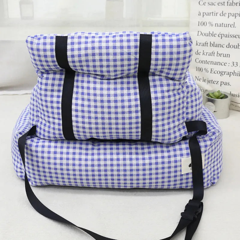 Grey and blue plaid cloth dog nest for car travel, shown in small and large sizes.
