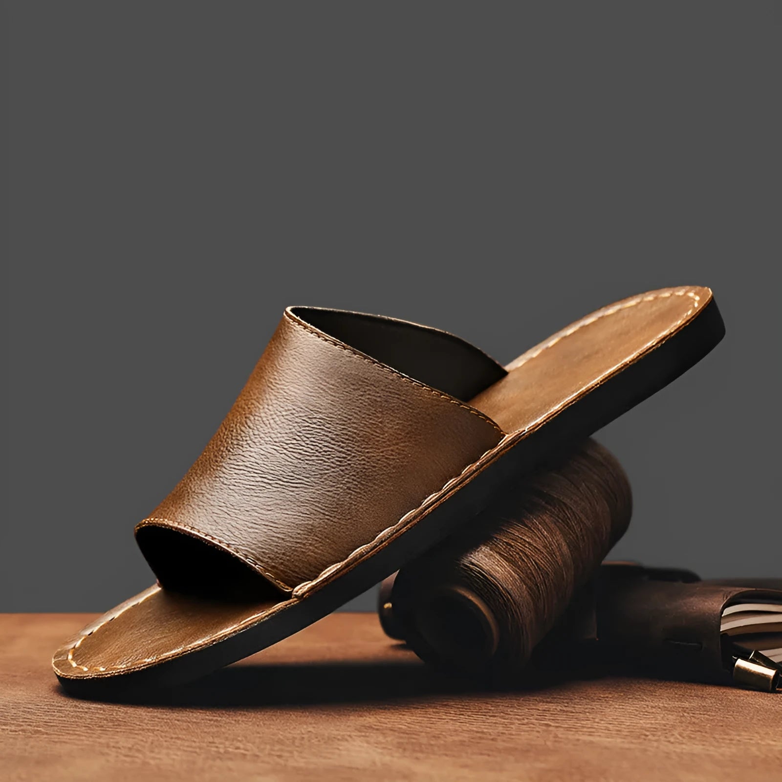 Men's brown leather sandals with adjustable straps and a rubber sole for outdoor casual wear.