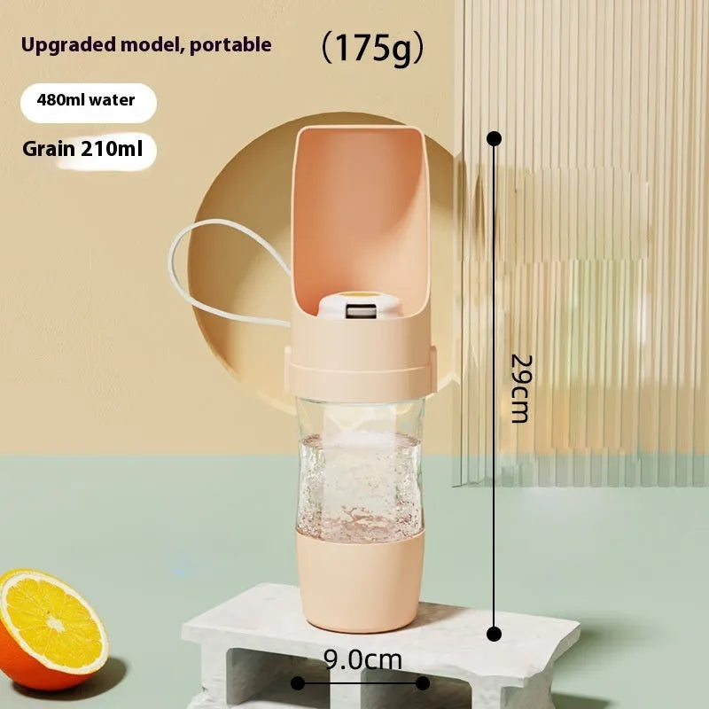 Green portable pet water bottle and food feeder with attached lanyard, showing transparent cup design.
