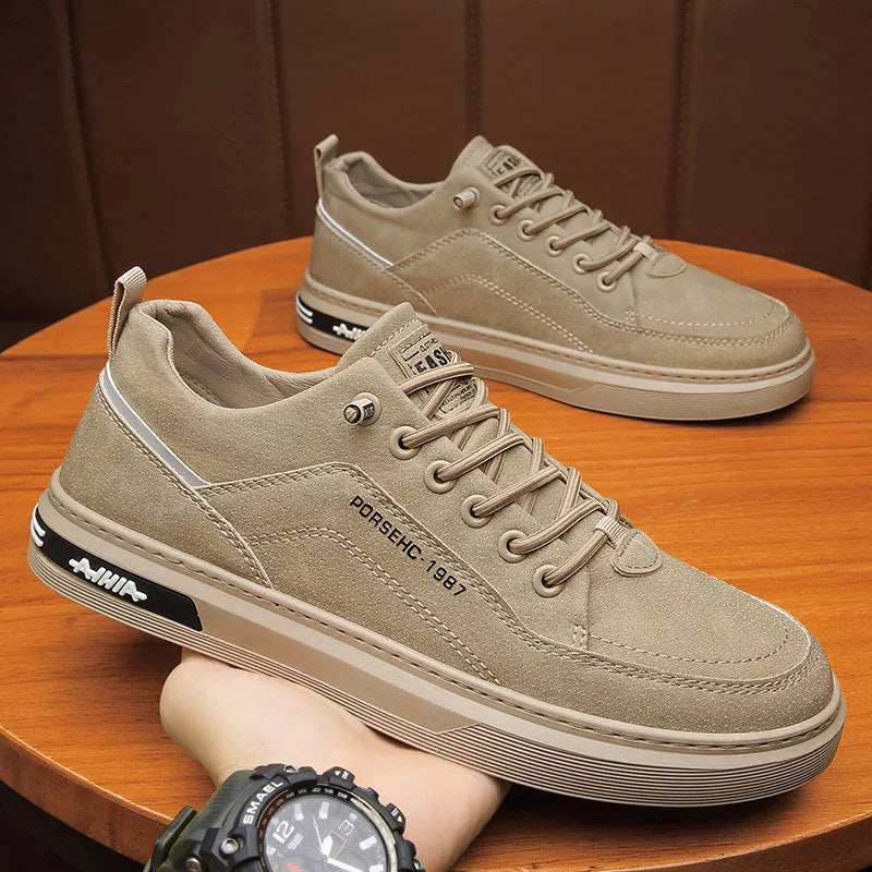 Men's low top casual shoe in khaki with artificial PU upper and flat rubber sole.
