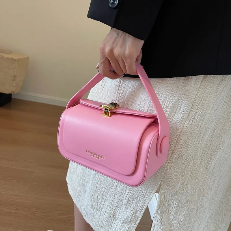 Personalised women's messenger bag with decorative stitching and letter details in medium-hard PU material