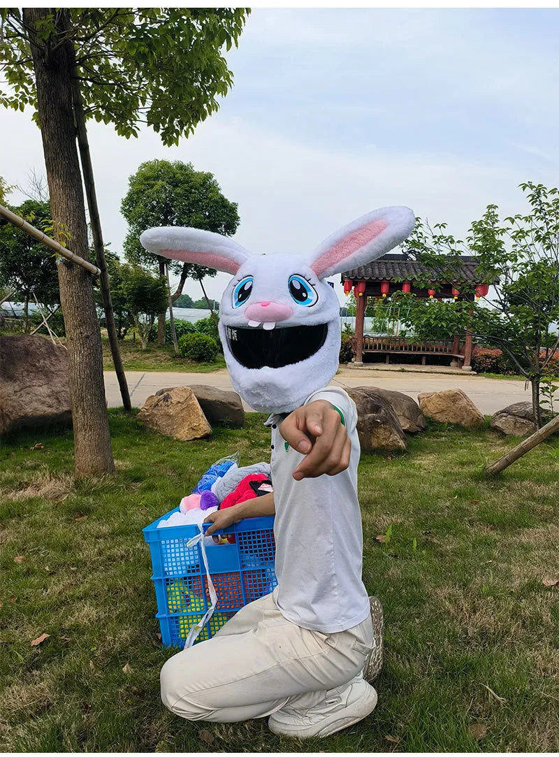 White plush rabbit head helmet cover for electric motorcycle with long ears and needle plush detailing
