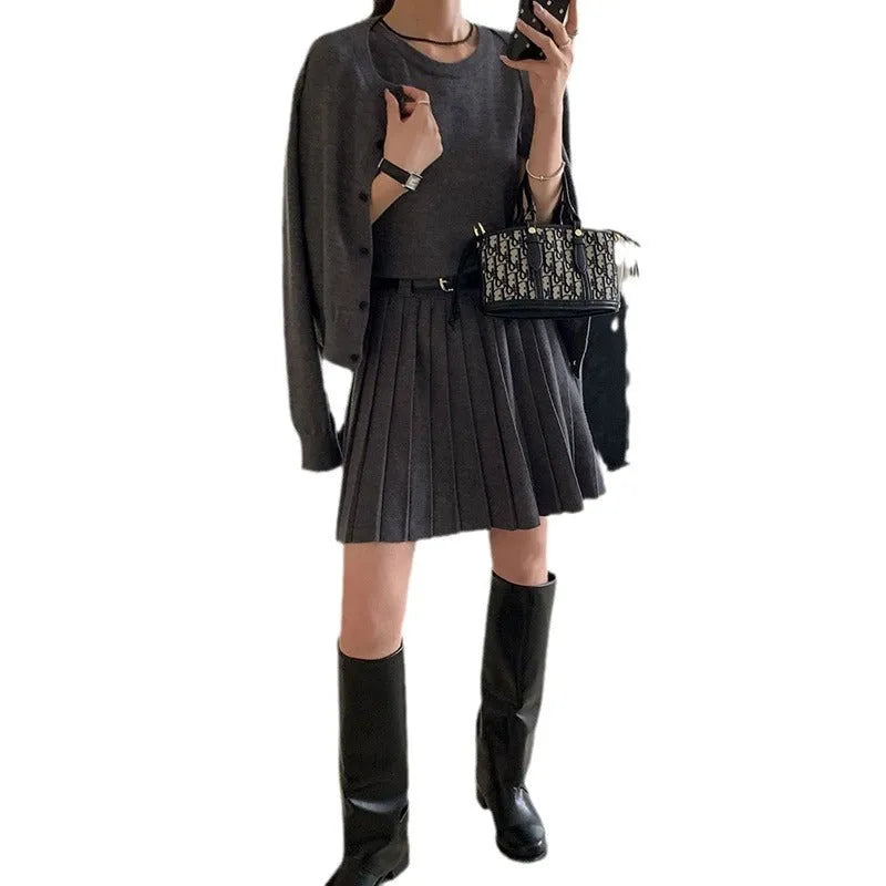 Women's black knitted two-piece set with pleated vest skirt and long-sleeve cardigan, national style art retro design