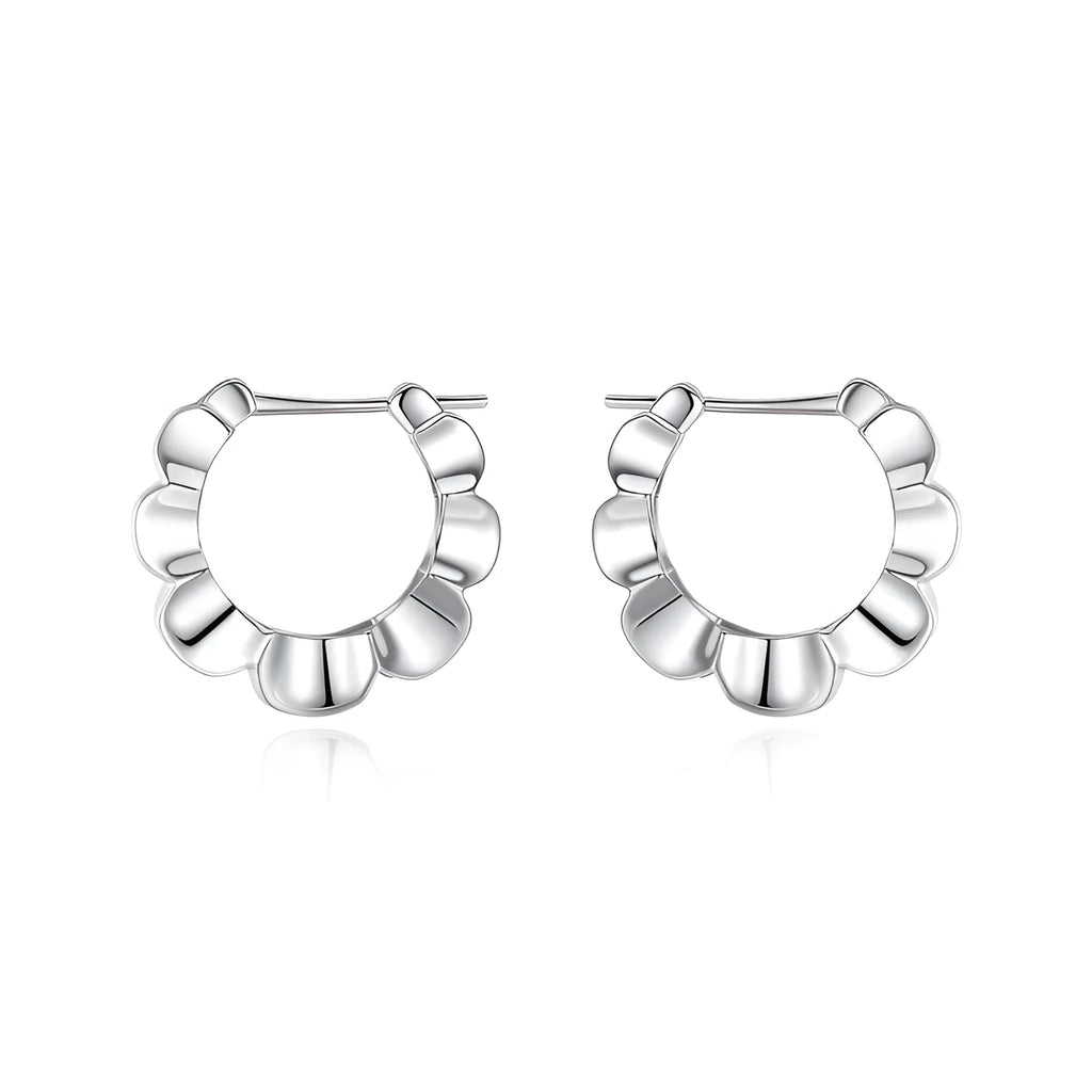 Pair of sterling silver geometric stud earrings with round decorative elements
