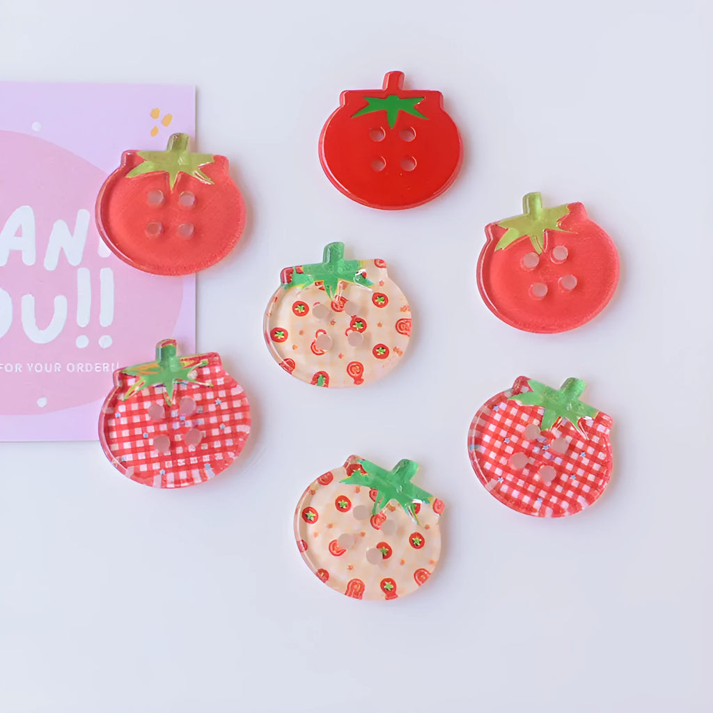 Set of medium-sized plastic or resin round tomato buttons with printed patterns in mixed or solid colours