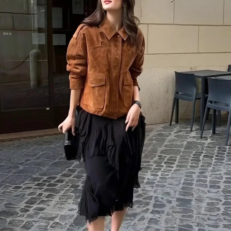 Women's suede-look polyester coat in bright brown colour with regular sleeves on mannequin