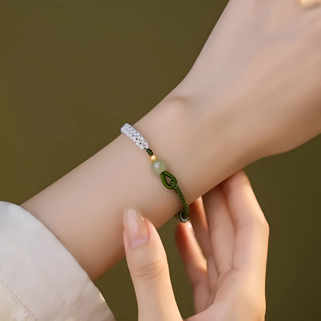 Chinese national bracelet with Hetian jade, sterling silver, and colourful cord carrying strap