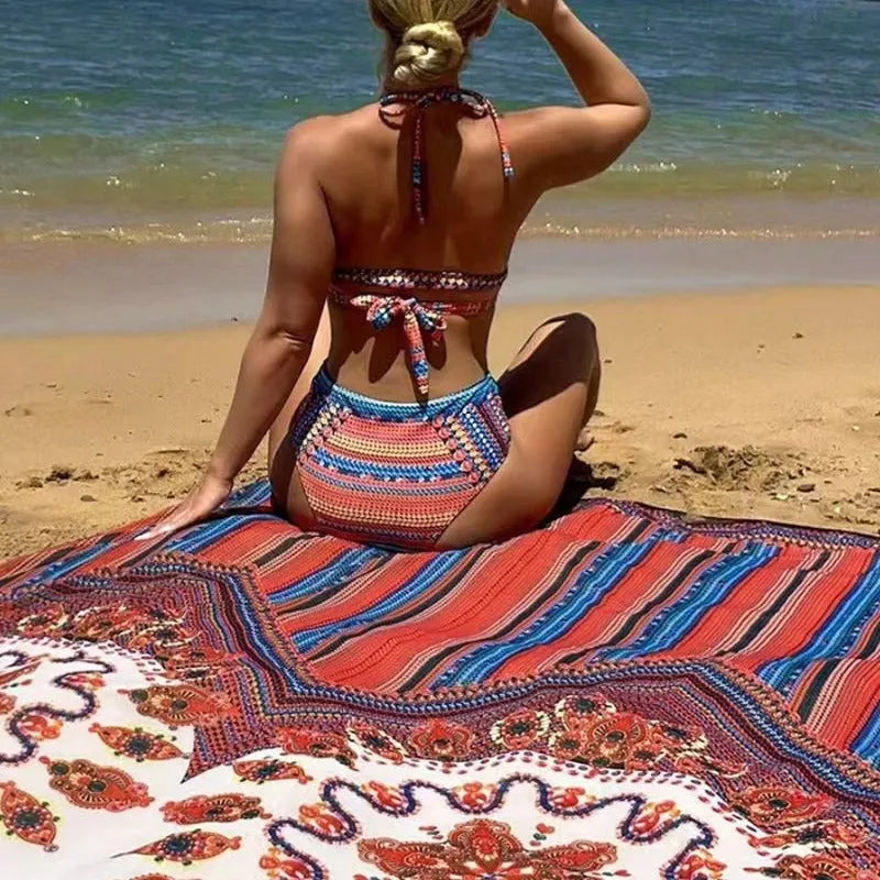 Women's three-piece split swimsuit set with high-waisted briefs, cutout blouse, and coat on a mannequin.