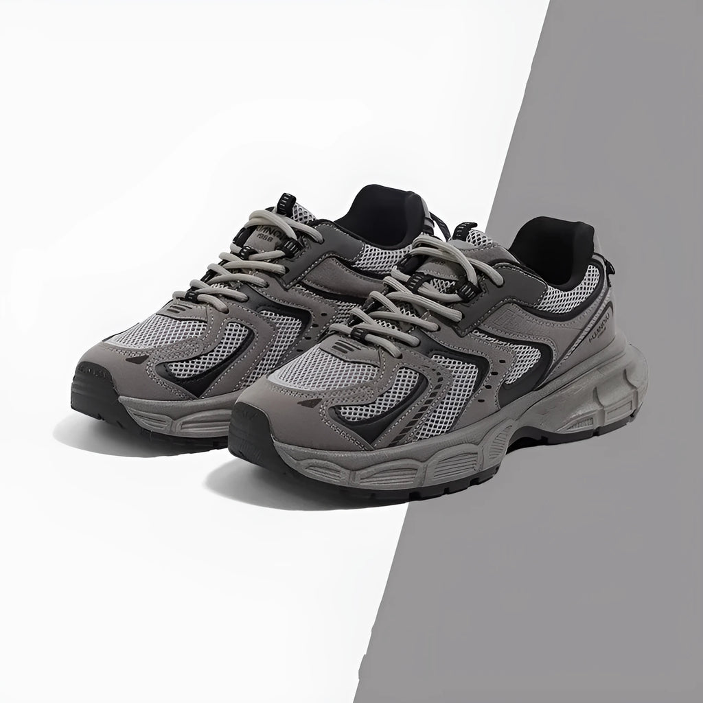 Grey platform dad shoes with PU mesh upper, leather stitching, and a chunky EVA sole.