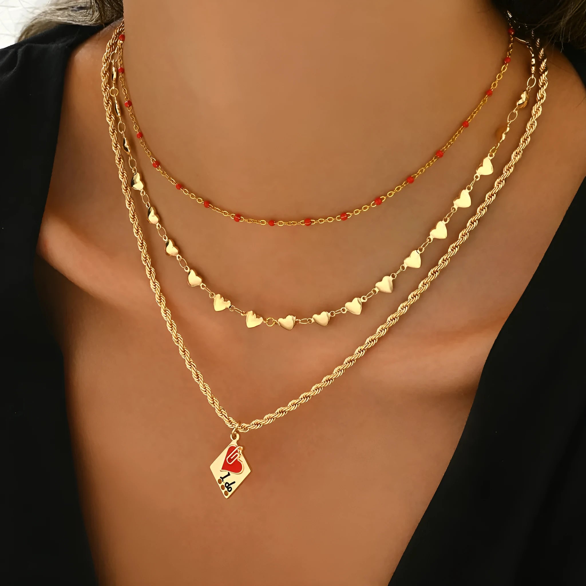 Adjustable three-layer zinc alloy clavicle chain necklace with a geometric heart pendant.