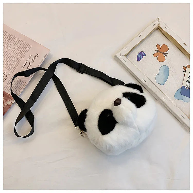 Plush cylindrical crossbody bag with panda head design measuring 18cm