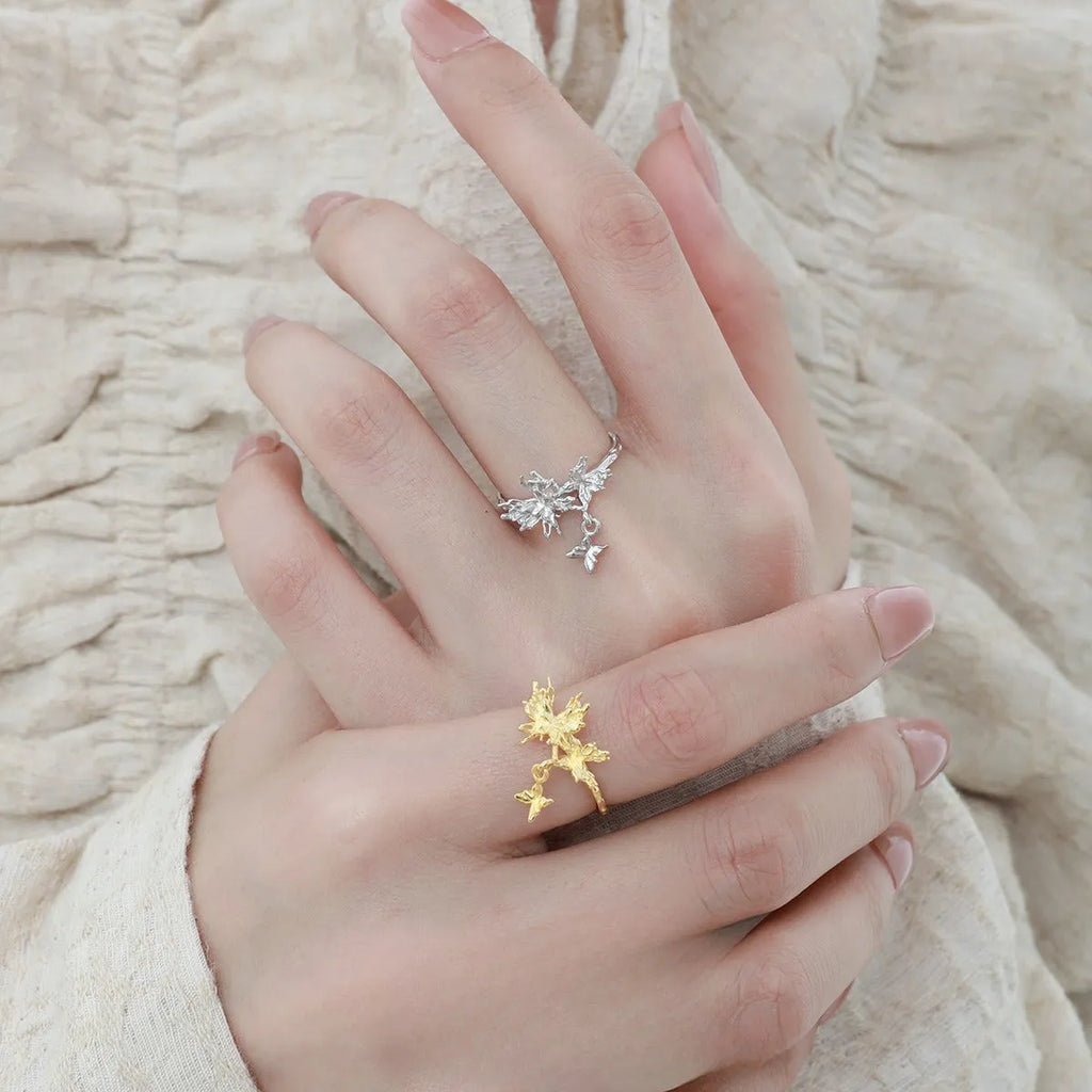 Adjustable silver butterfly ring showing electroplated finish in either white gold or 18K gold colour option.