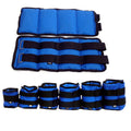 A pair of Oxford cloth legging sandbags for ankle weight training in track and field.