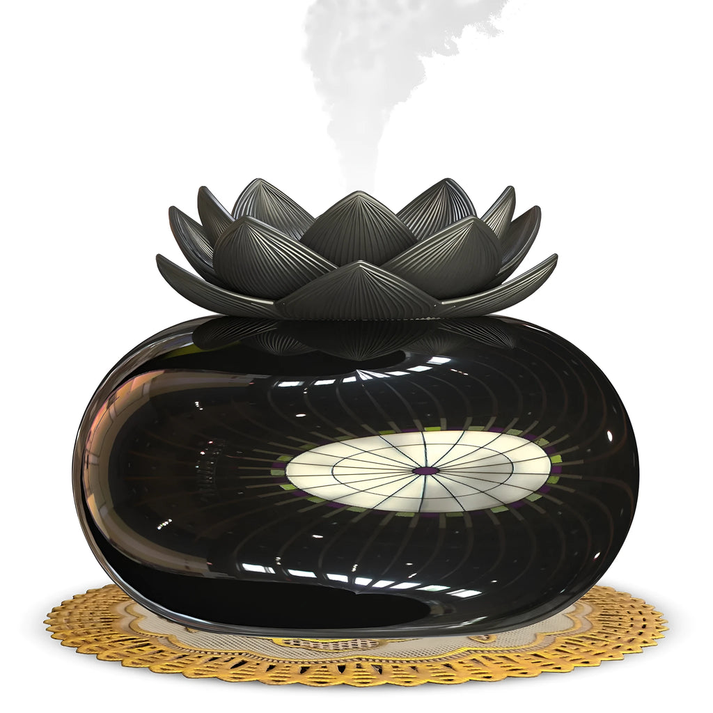 Pure black lotus aromatherapy humidifier with USB cable on desk surface