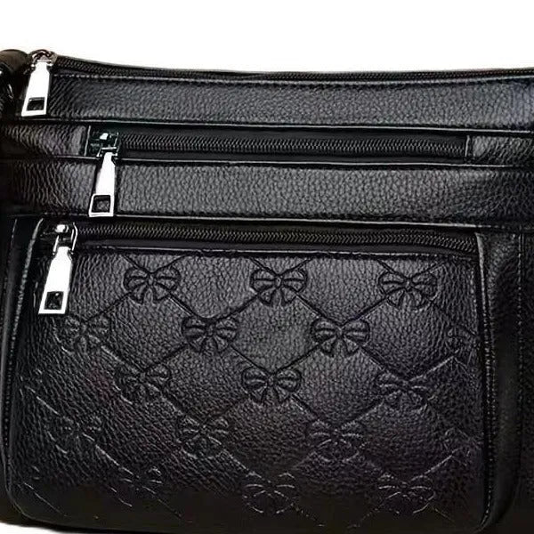 Butterfly black PU leather shoulder messenger bag with horizontal square shape and crossbody strap