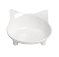 Black shallow melamine pet food bowl with non-slip rubber base on a wooden surface.
