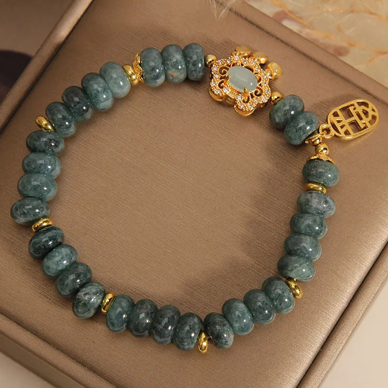 Women's natural emerald jade bracelet with abacus bead design and alloy safety lock closure