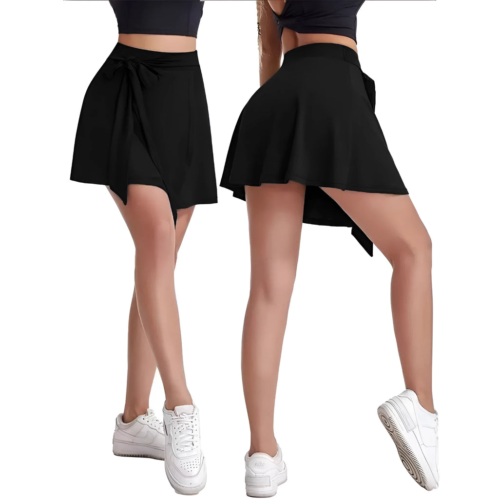 Black thigh-length sports skirt with built-in safety shorts and shoulder straps