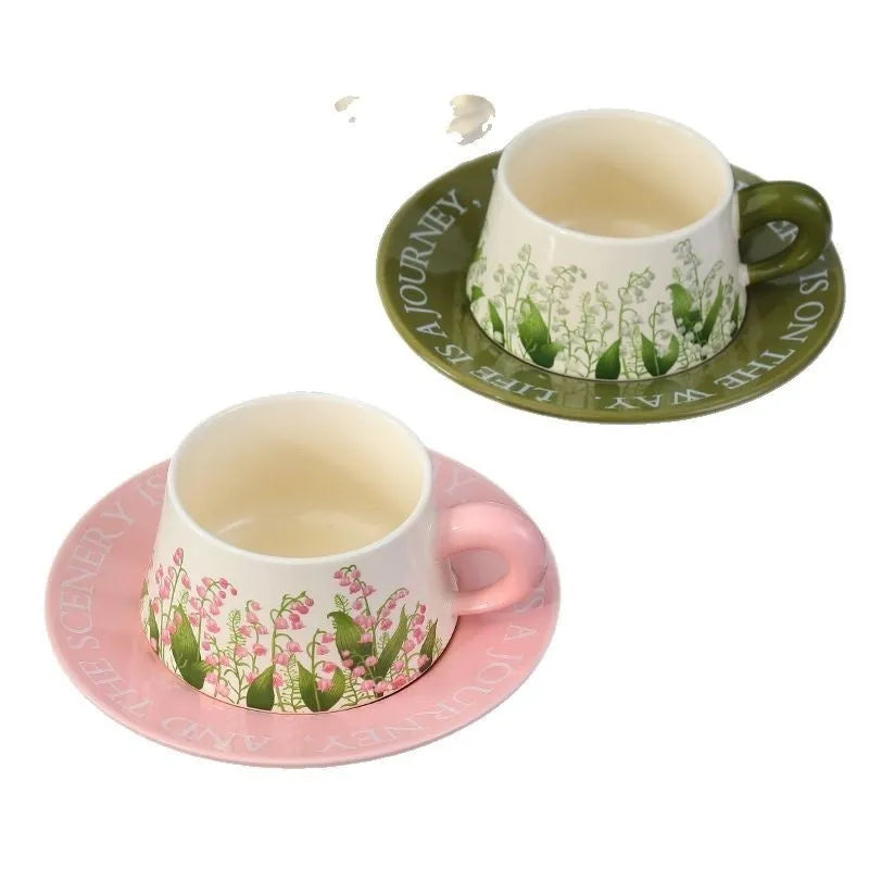 Ceramic coffee cup and saucer set with two cups, plates and stirring spoons