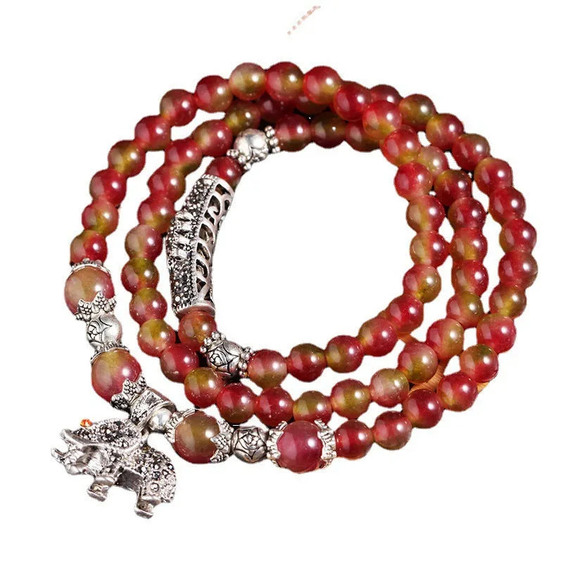 Natural watermelon crystal bracelet with Chinese knot design in 6mm and 8mm size options