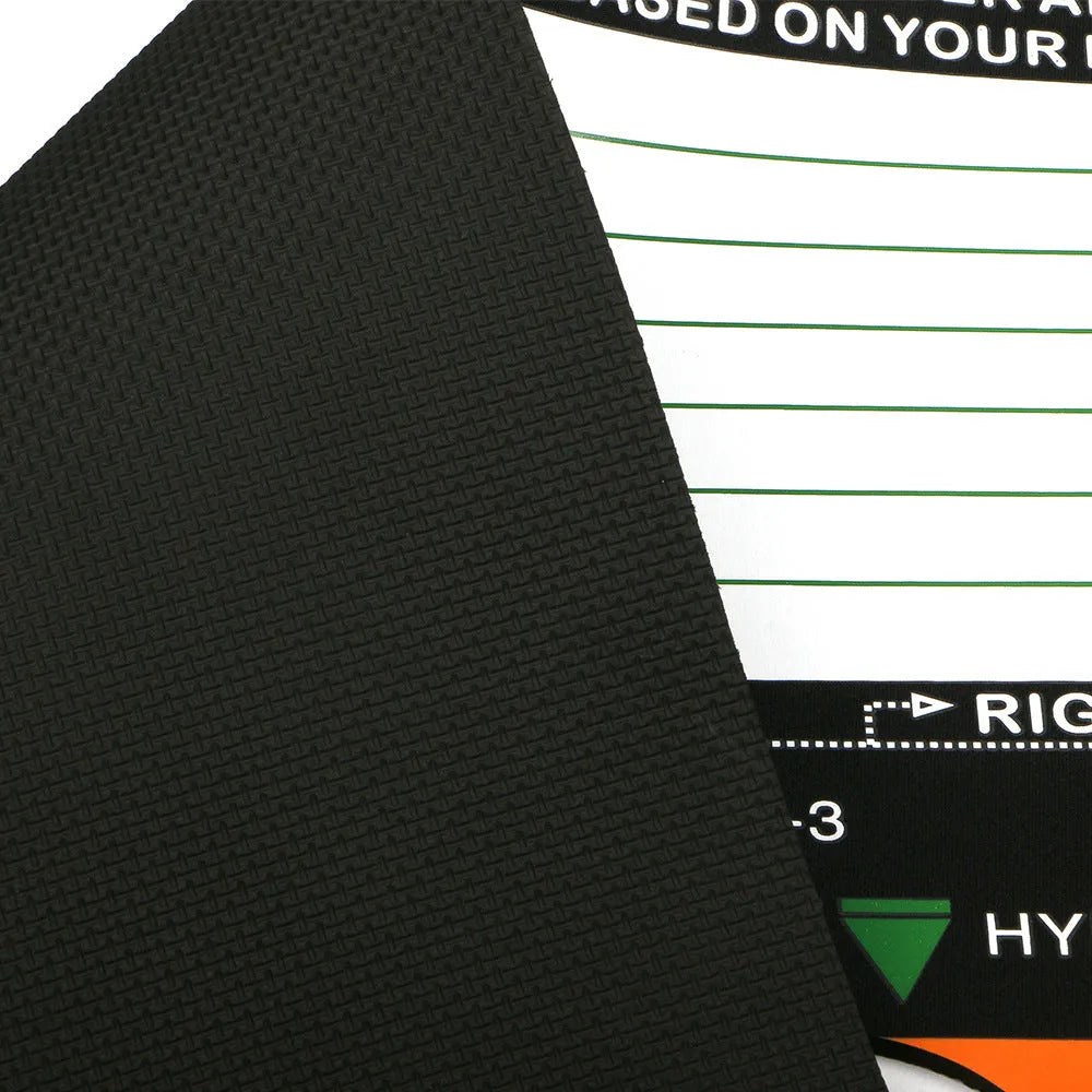 Black neoprene golf swing posture training pad on a green surface