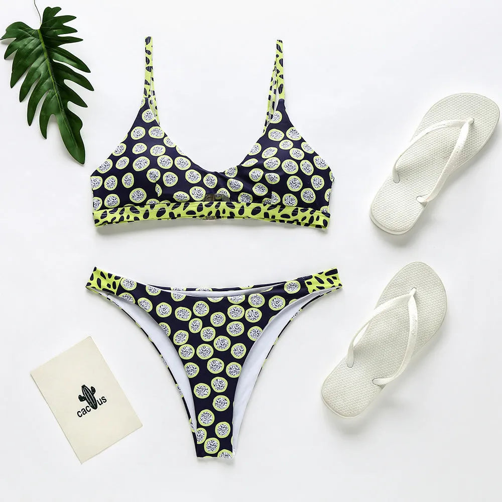 Women's bikini swimsuit set in black and white dots or red and white stripes, made from polyester fabric.