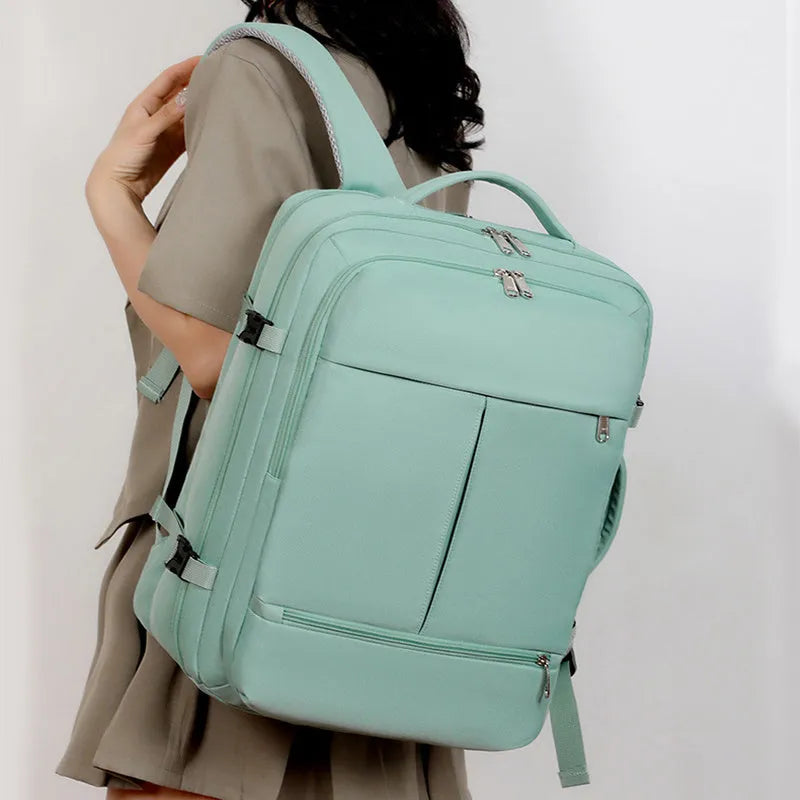 Waterproof Oxford cloth backpack in multiple colours showing laptop compartment and multiple pockets