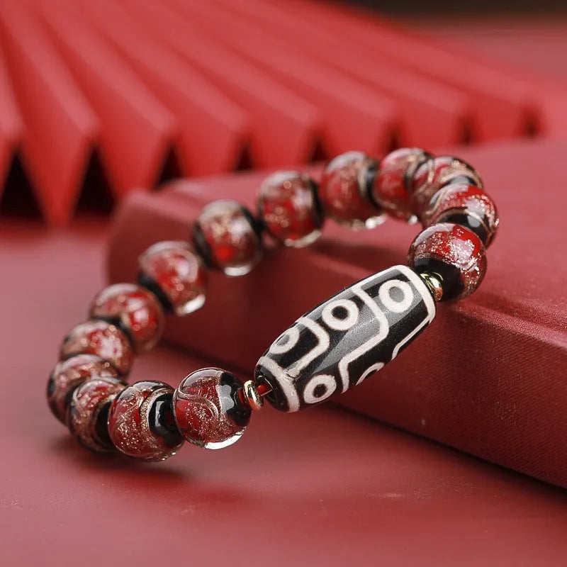 Chinese-style coloured glaze bracelet with five-colour snake lucky beads and auspicious patterns.