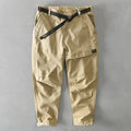 Men's loose-fit cotton casual overalls in army green colour showing mid-waist design