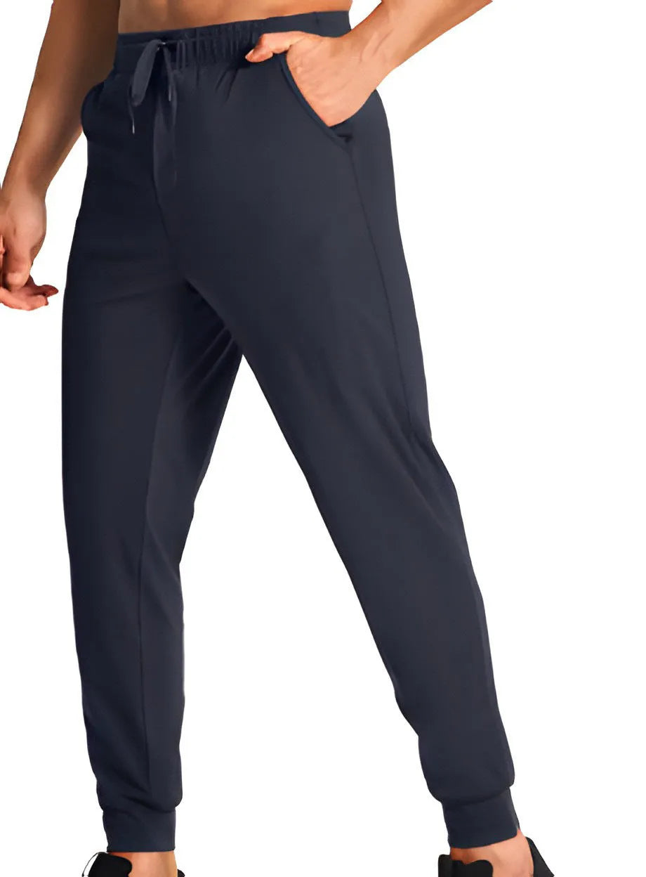 Men's loose fit casual trousers in solid colour with relaxed cut available in multiple sizes