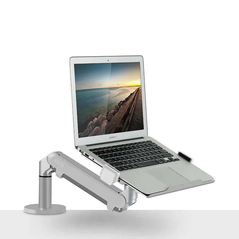 Black aluminium laptop stand with adjustable air pressure arm holding a notebook computer