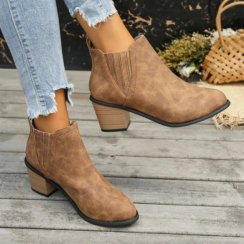 Women's black slip-on ankle boots with pointed toe and thick square heel